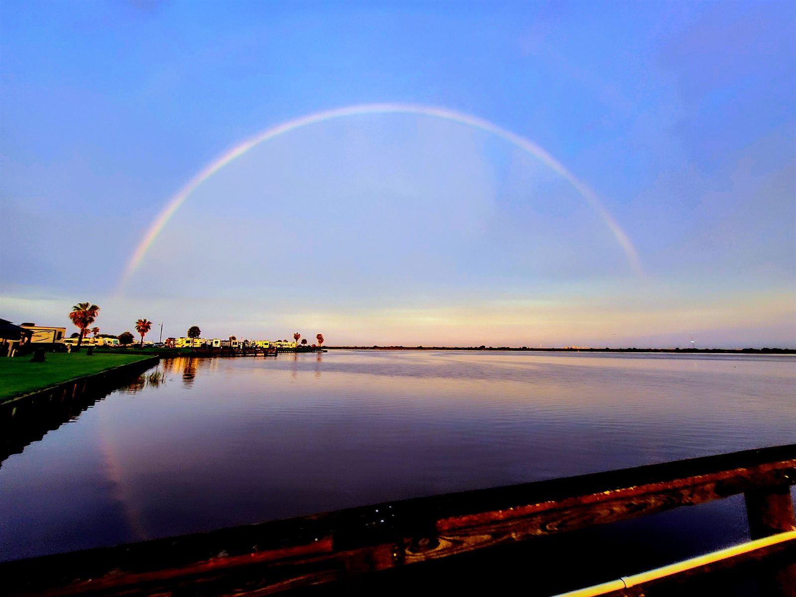 Spectacular Full Rainbow Arching Over Dickinson Bayou Pier and Resort